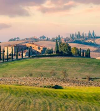 landscape with tuscan villa in background